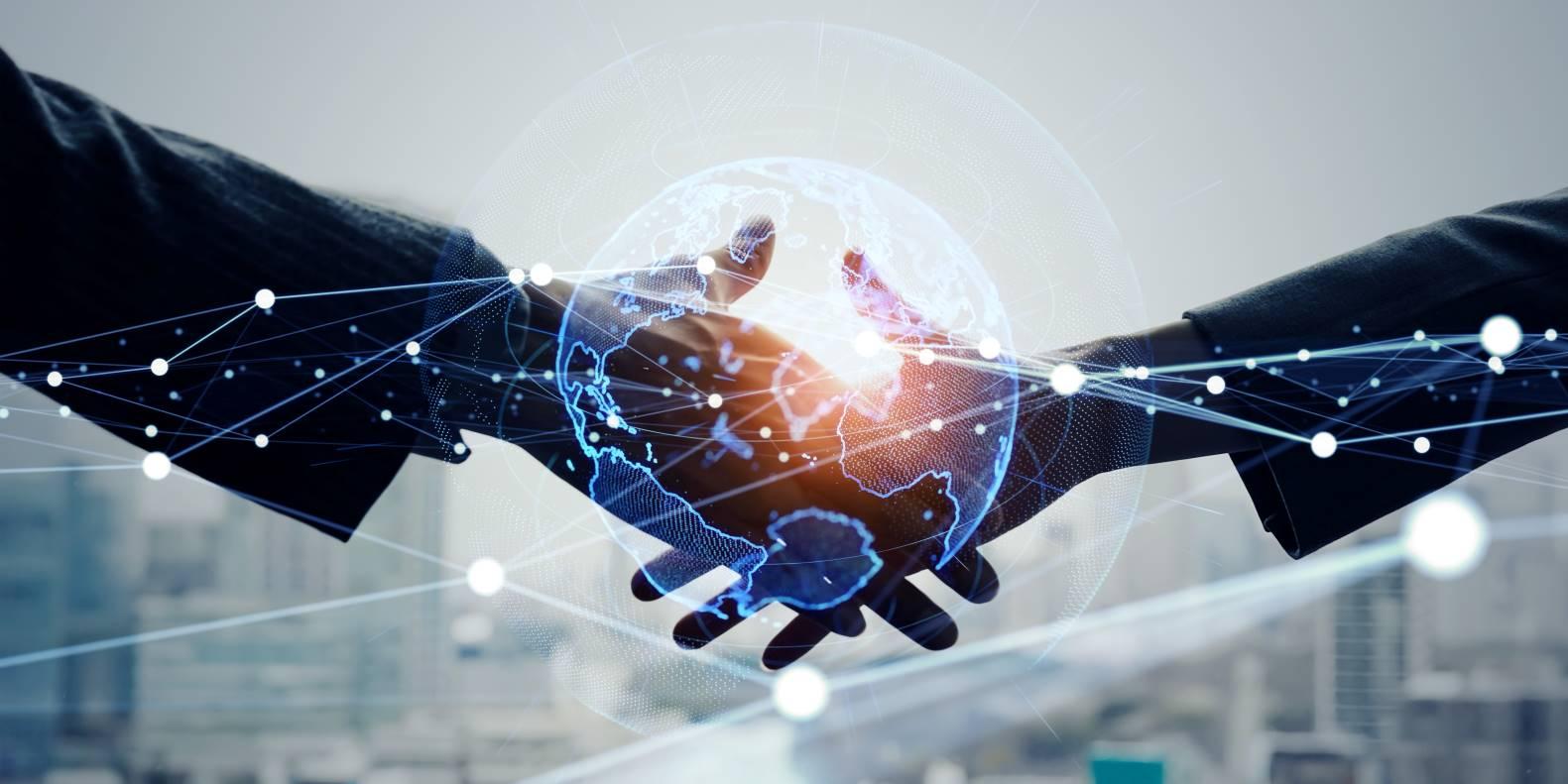 Business handshake, representing mergers and acquisitions and M&A deal value creation